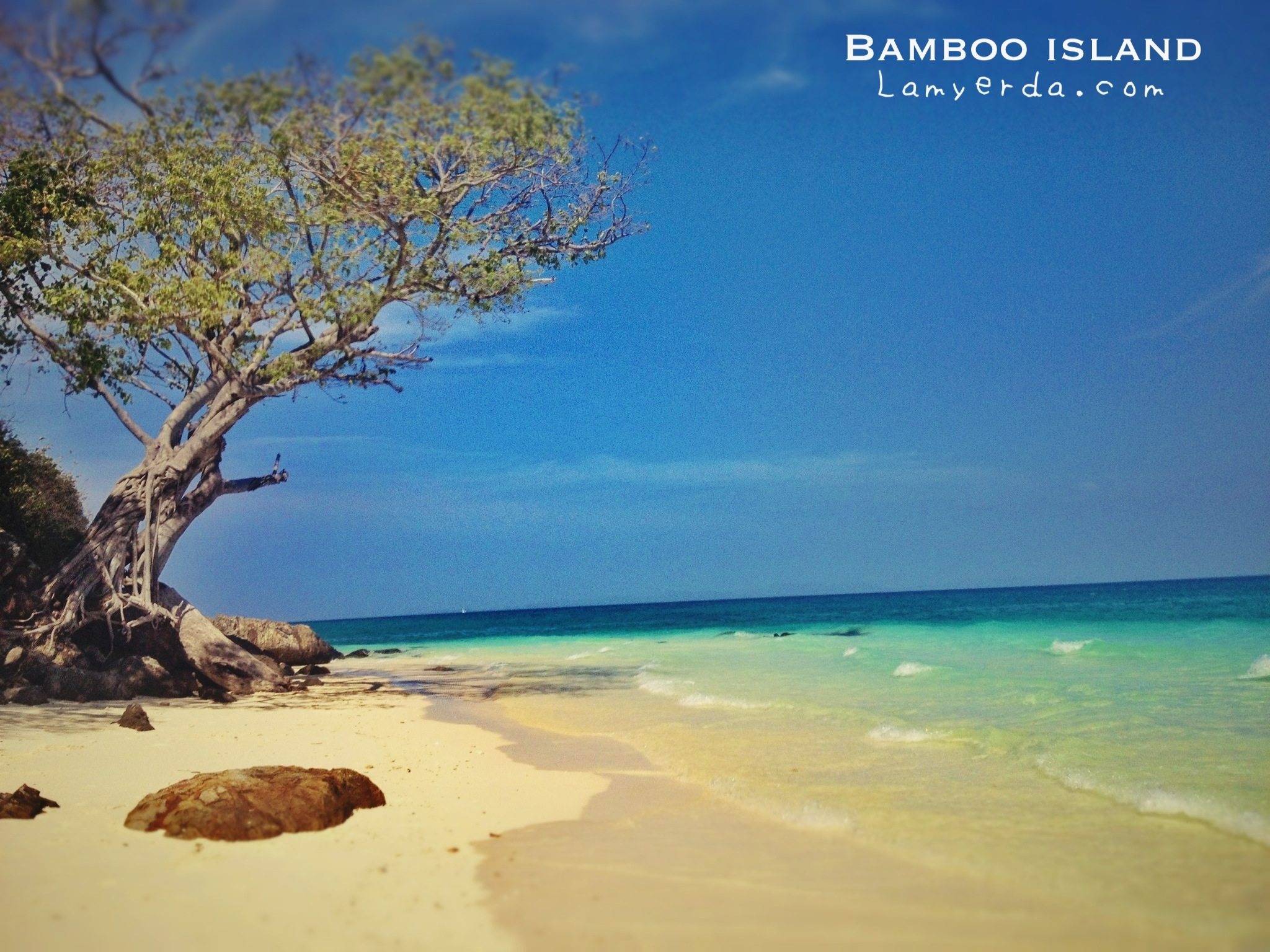 Swimming in the blue waters of Bamboo Island